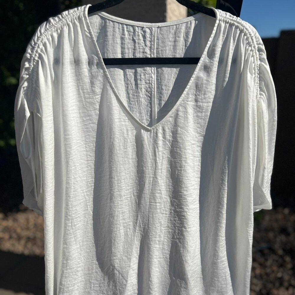SZL CAbi Seaside Top. White. Loose fit, lightweight, drop sleeve w/gather accent